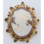 A gold mounted cameo brooch.