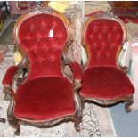 A Victorian carved walnut salon armchair upholstered in buttoned red dralon on cabriole legs,