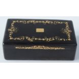 A Georgian tortoiseshell pique d'or snuff box with chased gold thumb piece.