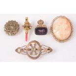 A cameo brooch, a late Georgian miniature rattle with coral teether and three other pieces.