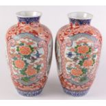 A pair of Japanese Imari baluster vases, Meiji period,