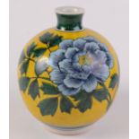A Chinese famille verte vase, the globular body with a yellow ground and large flowerheads,