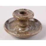 A Cornish serpentine chamber candlestick, height 7cm.