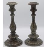 A pair of Cornish serpentine candlesticks,