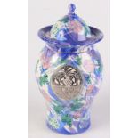 A Roger Michell lustre glaze jar and cover, the baluster shape body with abstract floral design,