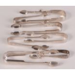 Seven pairs of silver sugar tongs. 7.5oz.