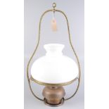 A Victorian hanging brass oil lamp, with opaque glass shade, height 69cm,