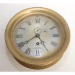 A brass American ship's clock, the circular silvered dial inscribed 'American S.
