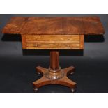 A William IV small rosewood veneered sofa table fitted with two drawers on concave fluted tapering