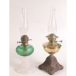 A brass and cast iron oil lamp late 19th/20th century, impressed F.S. & Co.