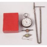 A silver cased open face pocket watch, a silver watch chain and two silver brooches.