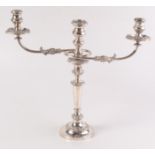 A three nozzle candelabra candlestick, height 42cm.