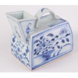 A Chinese blue and white porcelain bedpan of rectangular form,