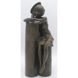 A Ronald Moll cold cast bronze figure of a young lady seated on a pillar, inscribed 'Ronald Moll,