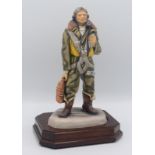 An Ashmor Worcester porcelain figure entitled 'Royal Air Force Bomber Aircrew, model no 36,