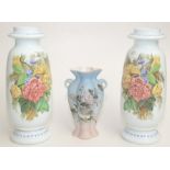 A pair of white opaque glass vases with enamel and painted floral decoration, early 20th century,