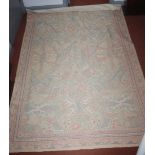 A European chainstitch rug, the polychrome field containing flowerheads, plants and guls,