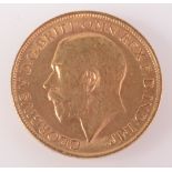 A George V sovereign dated 1911, extremely fine.