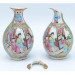 A pair of Chinese Canton porcelain vases, 19th century, with figures in an interior scene, birds,