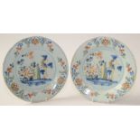 A pair of English delft pottery plates,