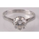 A good solitaire diamond ring set in platinum, the brilliant cut diamond of approximately 1.5ct.