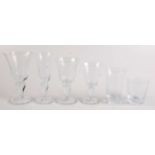 An extensive suite of Biot glasses comprising ten large wine glasses, height 18cm, diameter 10cm,