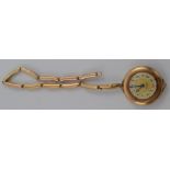 A ladies 10k gold cased Meric wristwatch with 15 jewel movement,