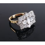 A good 18ct gold diamond cluster ring set three central baguette diamonds and twelve surrounding