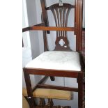 A walnut dining chair in 18th century style.