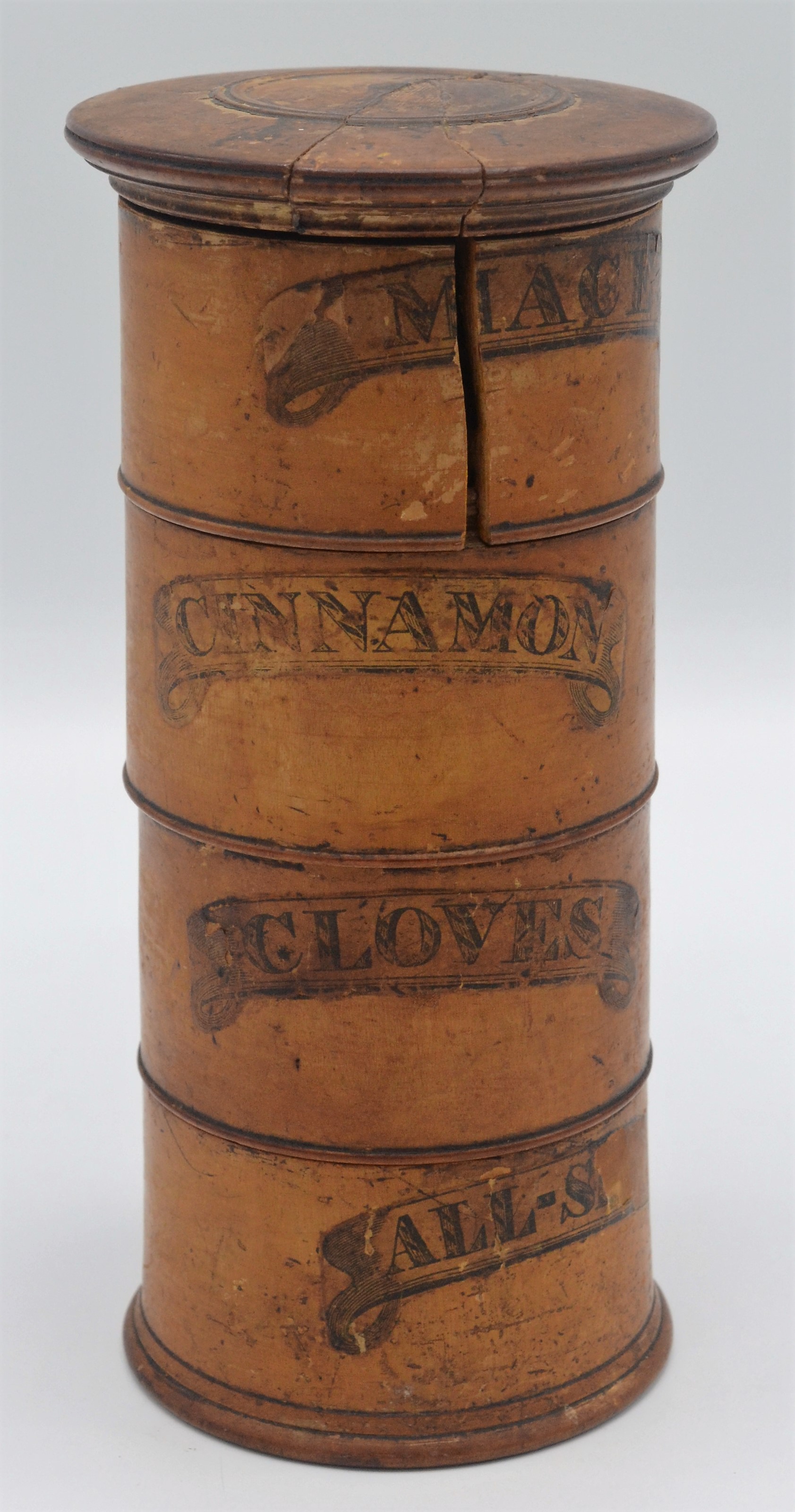 A Victorian treen spice tower, the four sections labelled 'Mace', 'Cinnamon',