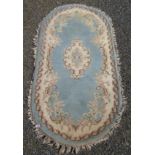 An Indian oval rug,