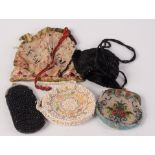 Three beadwork purses and two others.