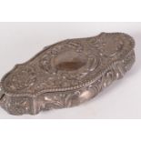 An Edwardian shaped oval embossed toilet box with hinged lid.