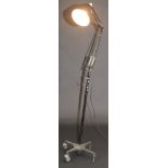 A black Anglepoise standing lamp the iron quadruple base numbered 30 L32/1,