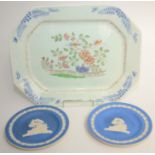 A pair of Copeland Spode blue jasper plates, decorated with dogs in a country scene,