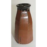 A John Reeve stoneware tenmoku, seven sided vase, height 27cm,