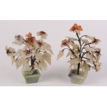 A pair of Chinese hardstone flowering trees, mid 20th century, height 25cm.