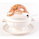 An Italian pottery lobster tureen, with oval stand and ladle, height 25cm.