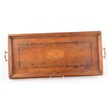 A rectangular oak tray, with shell inlay and a pair of brass handles, 75 x 33cm.