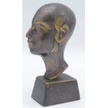 A bronze sculpture of a Jewish profile bust on a rectangular plinth base,