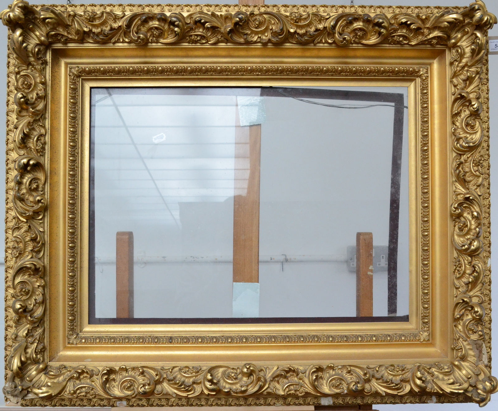 An ornate 19th century gilt picture frame, internal dimensions 46 x 61cm. - Image 2 of 2