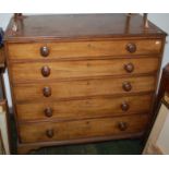 A George III mahogany chest of five long graduated drawers, original turned wood knobs, width 109.