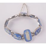 A silver bracelet with nine Wedgwood double sided Jasper cameos.