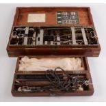 A surgeon's case of instruments, comprising of three trays,