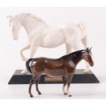 A Beswick bisque porcelain figure of a horse,