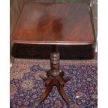 A George IV mahogany occasional table with quadruple base, together with a standard lamp.