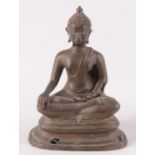 A bronze seated figure of Buddha, height 21cm.