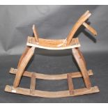 A cider barrel rocking horse, made by Reg Langford, cooper of Taunton Cider Company,