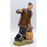 An Ashmor Worcester porcelain figure of a member of the Royal Air Force ground crew entitled 'The