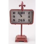 A metal framed clock, battery operated, height 39cm.